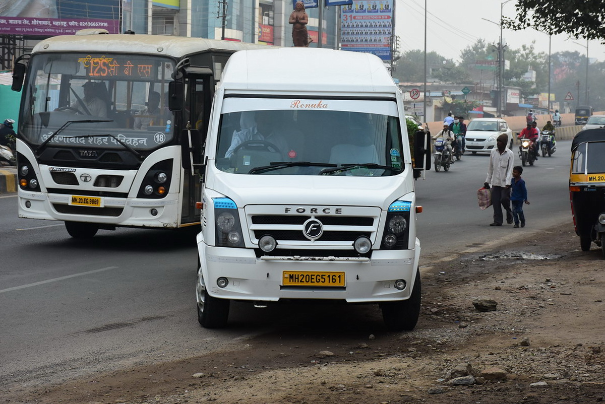 Our vehicle in front of Hotel Global Inn 